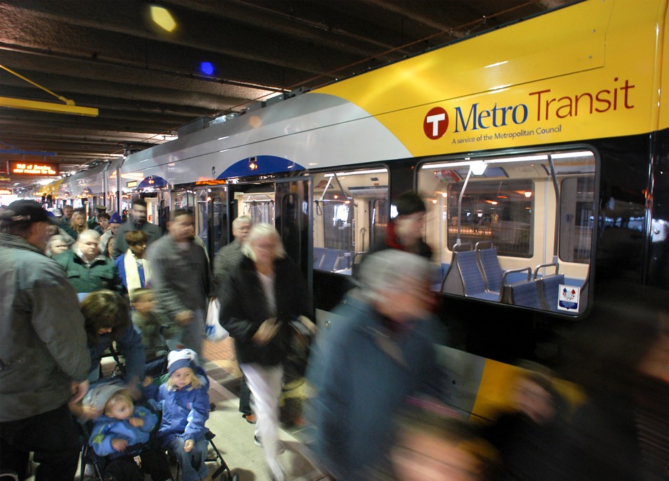 Throngs of shoppers arrive at the Mall of America in Bloomington, Minnesota, on Saturday, Dec.4, 2004, when the light-rail transit line opened its final four miles of track.