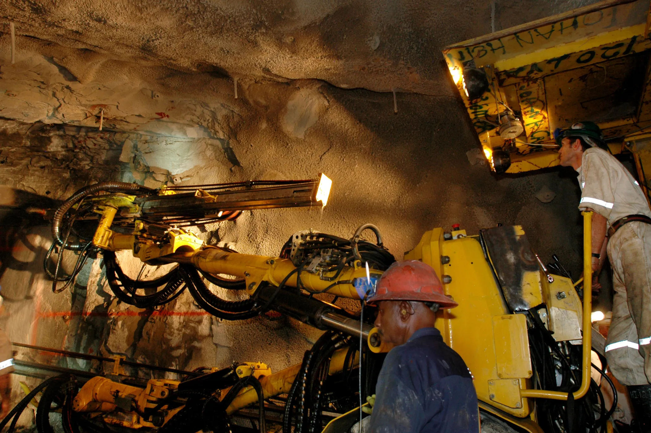 A jumbo drill rig works under ground at Anglo Gold Ashanti's Mponeng gold mine near Carltonville, South Africa.