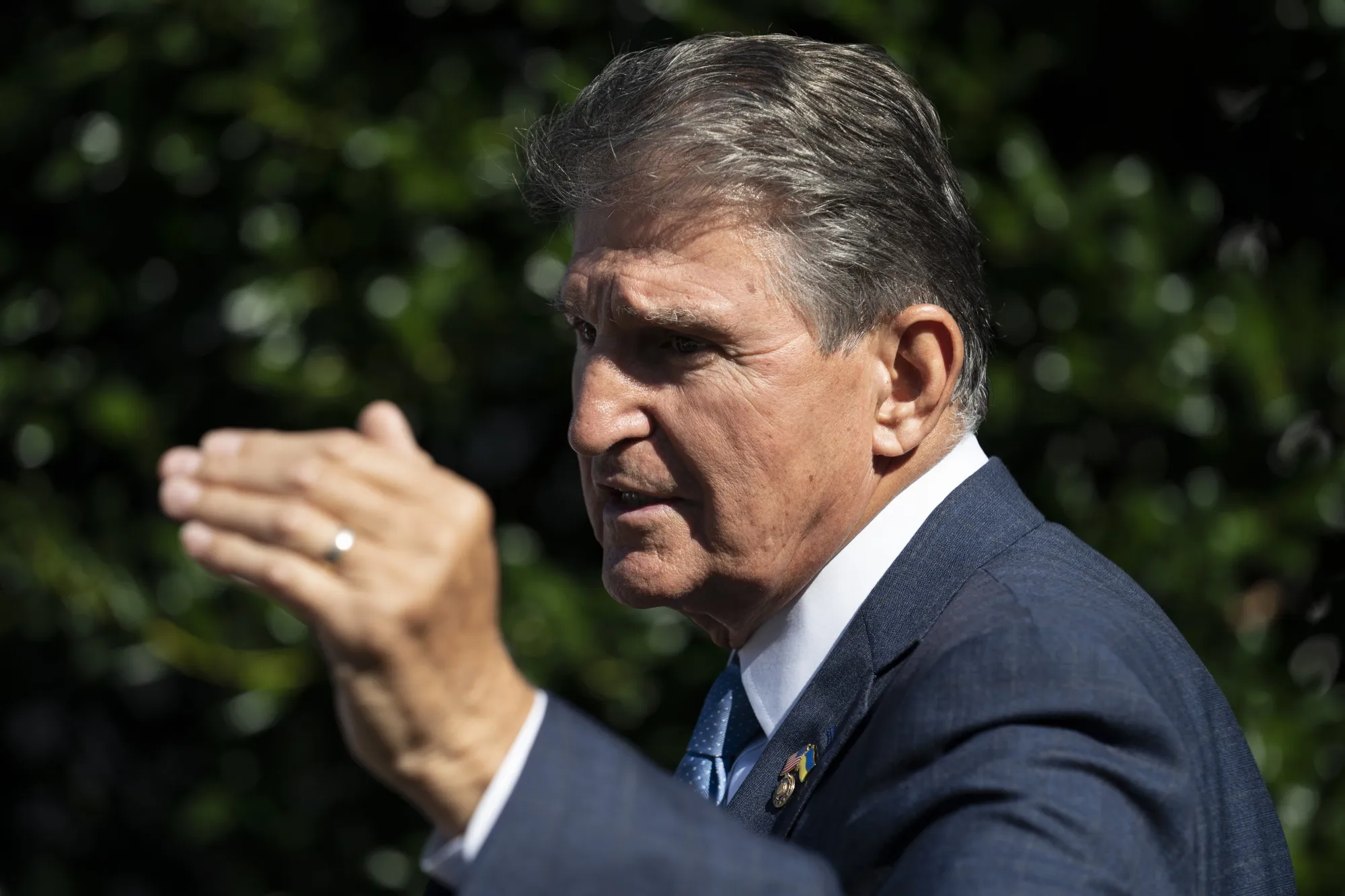 Manchin speaks to members of the media outside of the West Wing after President Biden signed the Inflation Reduction Act of 2022 on Aug. 16.