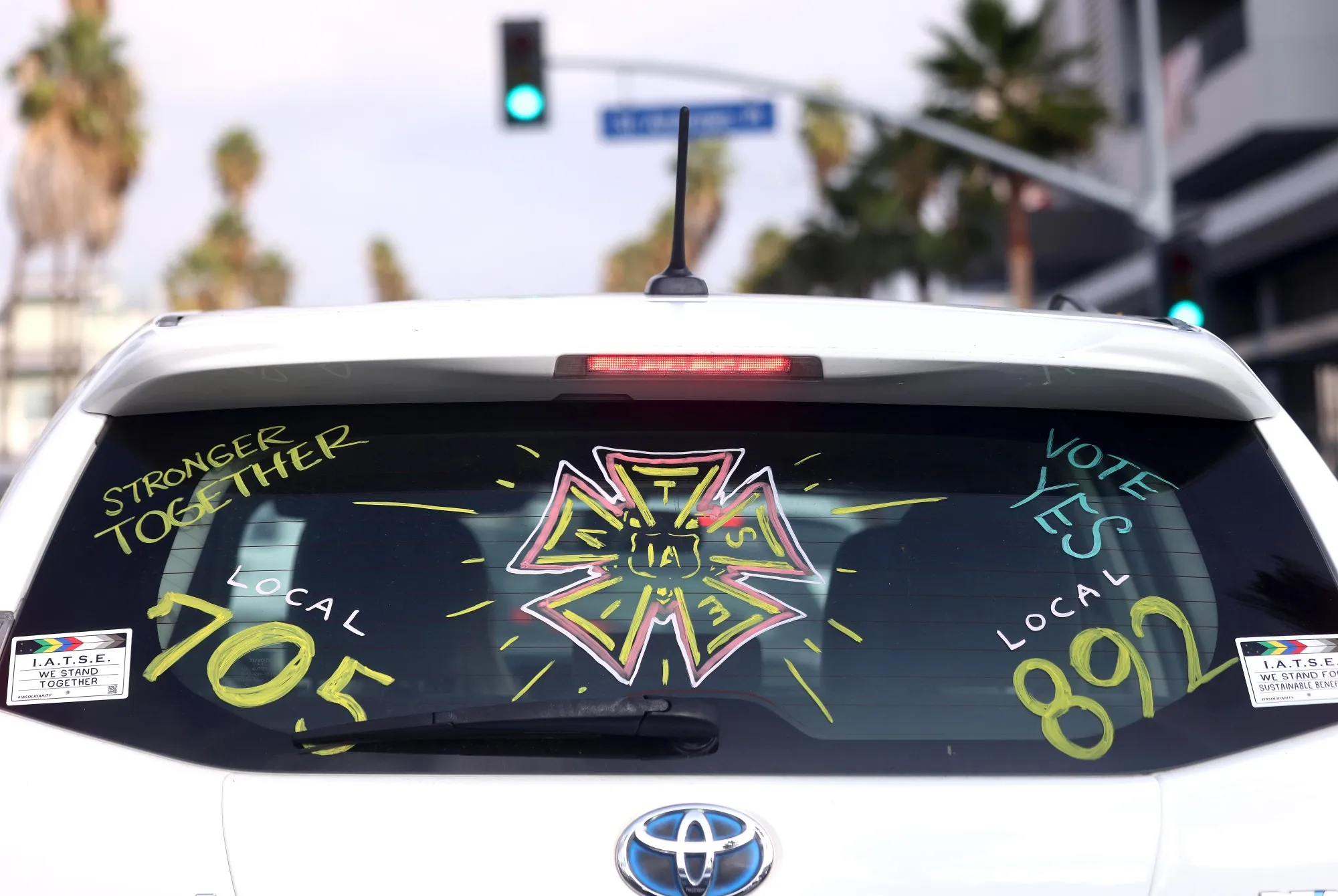A driver displays their support for the IATSE union in Los Angeles on Oct. 7.