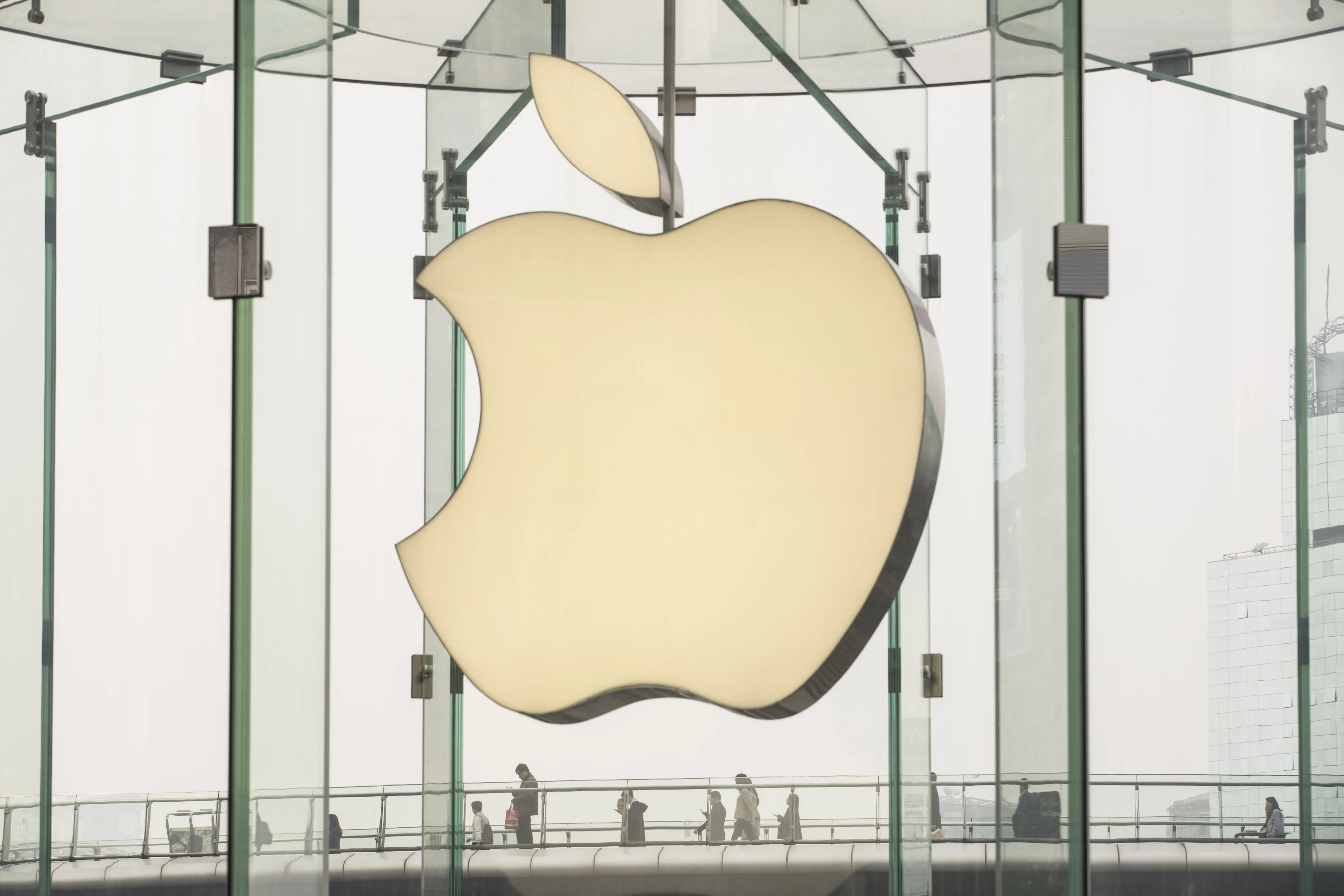 Signage for an Apple Inc. store at the Shanghai International Center shopping mall.
