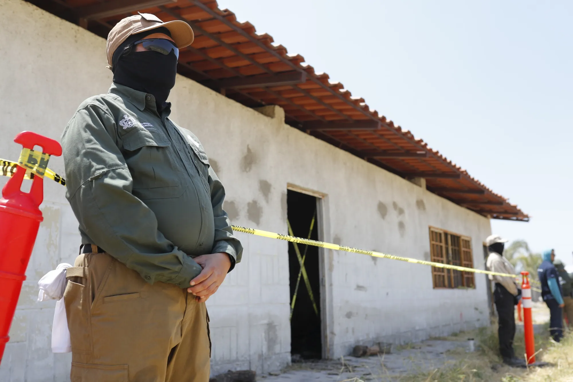 Agents during an investigation into an alleged cartel killing site in Teuchitlán, Jalisco, Mexico, in 2024.