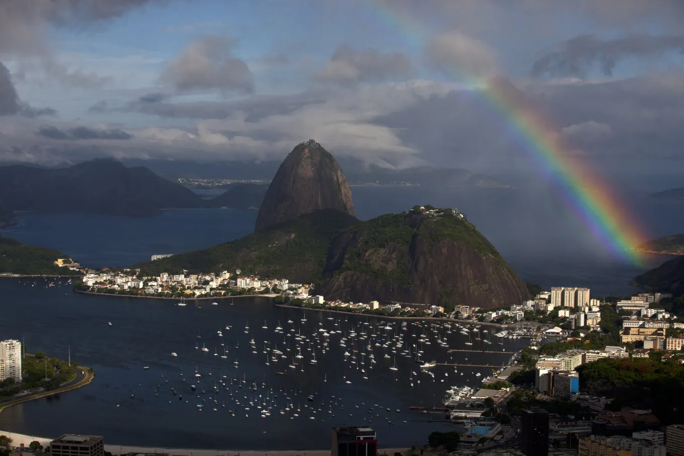 A rainbow appears over Sugarloaf mountain at Guanabara bay in Rio de Janeiro.