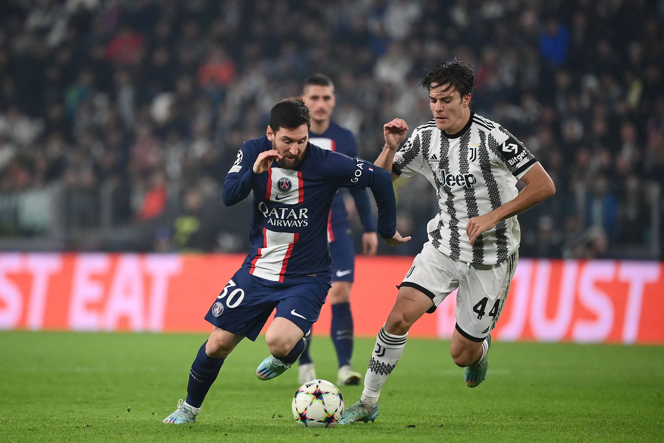 Paris Saint-Germain's forward Lionel Messi, left, runs with the ball during a match between&nbsp;in Turin on Nov. 2.