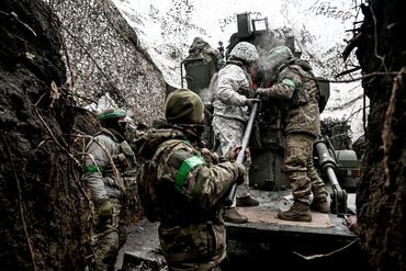 Ukrainian artillery soldiers in action in Donetsk region