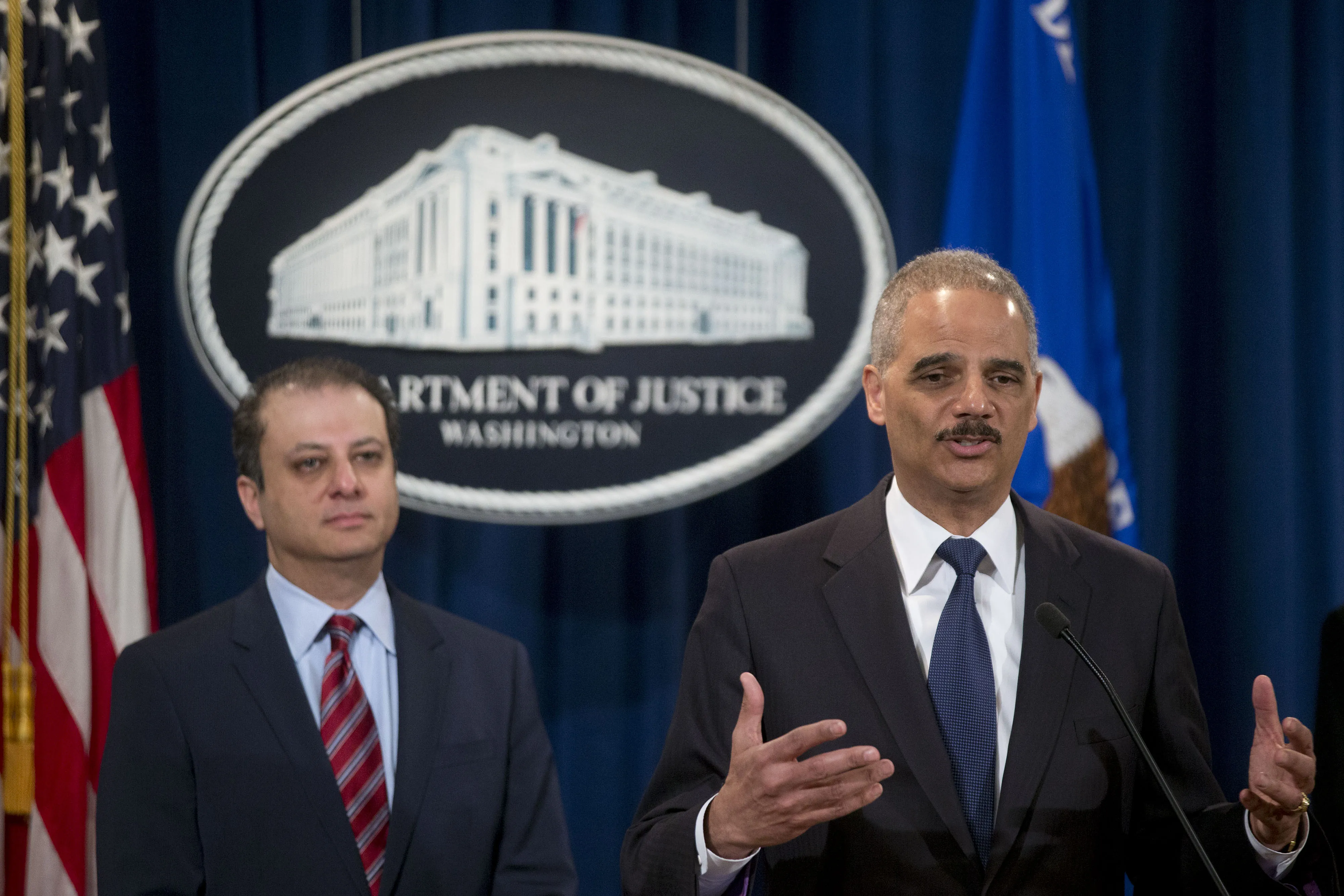 Preet Bharara and&nbsp;Eric Holder keep saying, and saying, too-big-to-jail doesn't exist. Photographer: Andrew Harrer/Bloomberg
