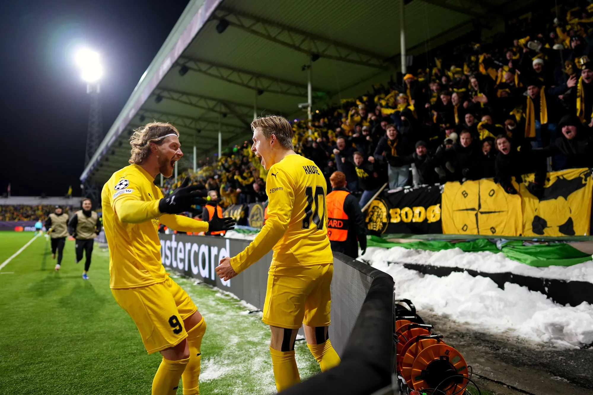 Bodo Glimt’s Jens Petter Hauge&nbsp;celebrates scoring his team's second goal with teammate Kasper Hogh during the&nbsp;Champions League first leg match against&nbsp;Inter Milan at the Aspmyra Stadion on Feb. 18.