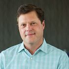 Headshot of Dr Reid M Huber