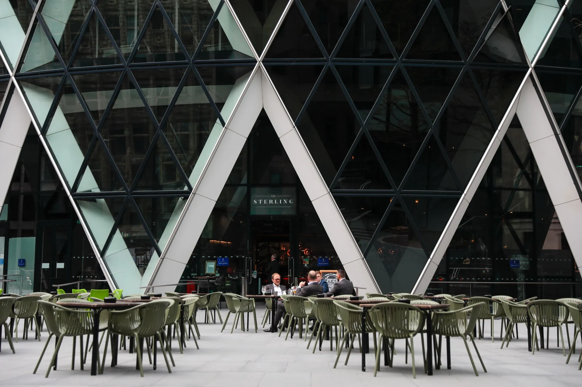 Customers sit at a restaurant in London&nbsp;on&nbsp;Sept. 7.