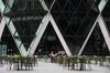 Customers sit at a restaurant in London on Sept. 7.