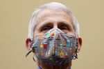 Anthony Fauci, director of the National Institute of Allergy and Infectious Diseases, wears a protective mask during a Select Subcommittee On Coronavirus Crisis hearing in Washington, D.C., U.S., on Thursday, April 15, 2021. Top U.S. health officials, set to testify Thursday at a House hearing, are likely to face questions about the governments decision to pause use of Johnson & Johnsons Covid-19 vaccine after a small number of recipients developed severe blood clots.