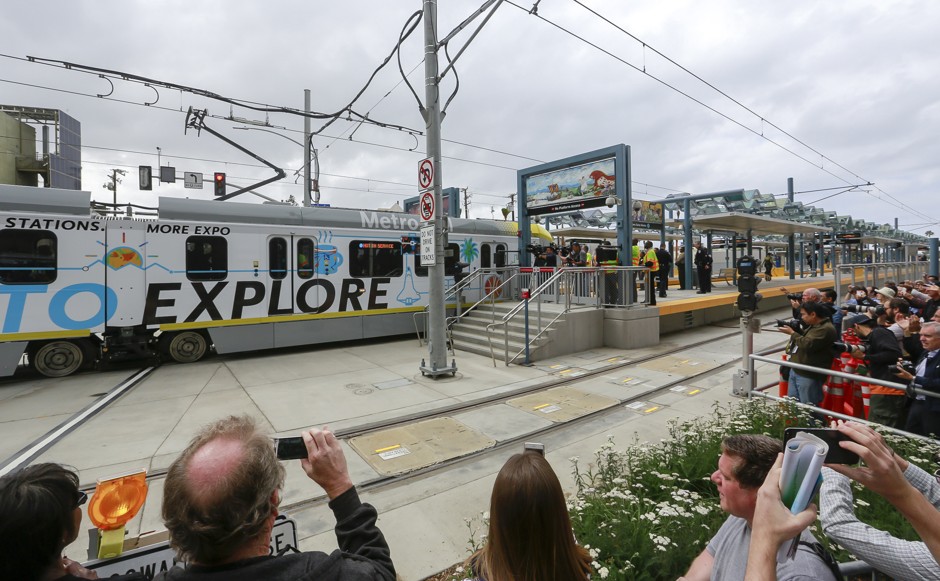 A commuter light rail arrives to mark the opening of the 6.6-mile extension of the Expo Line at the new Metro Expo Line in Santa Monica, California.
