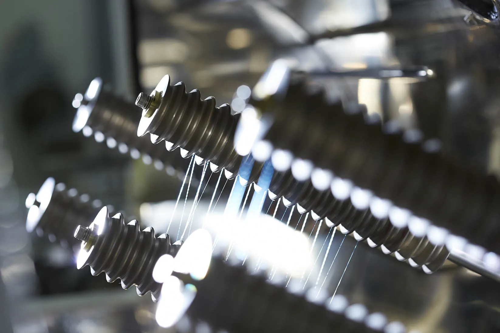 Qmonos proteins being processed and spun into threads.
