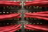 Rows of colored high end data cables are seen feeding into racks of computer servers inside a comms room at an office in London, U.K., on Tuesday, Dec. 23, 2014. Vodafone Group Plc will ask telecommunications regulator Ofcom to guarantee that U.K. wireless carriers, which rely on BT's fiber network to transmit voice and data traffic across the country, are treated fairly when BT sets prices and connects their broadcasting towers.