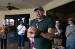 Adrian Fontes, Arizona’s Democratic candidate for secretary of state, speaks with canvassers at the Arizona Democrats Legislative District 4 office in Scottsdale on Oct. 15.