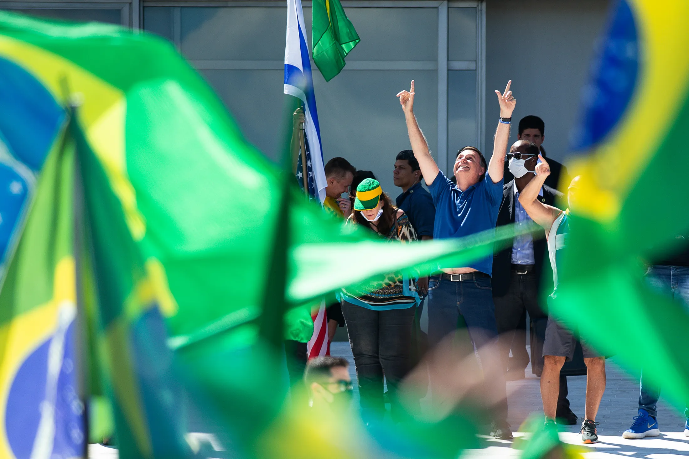 Bolsonaro gestures while attending a protests at the Planalto Palace on May 3.