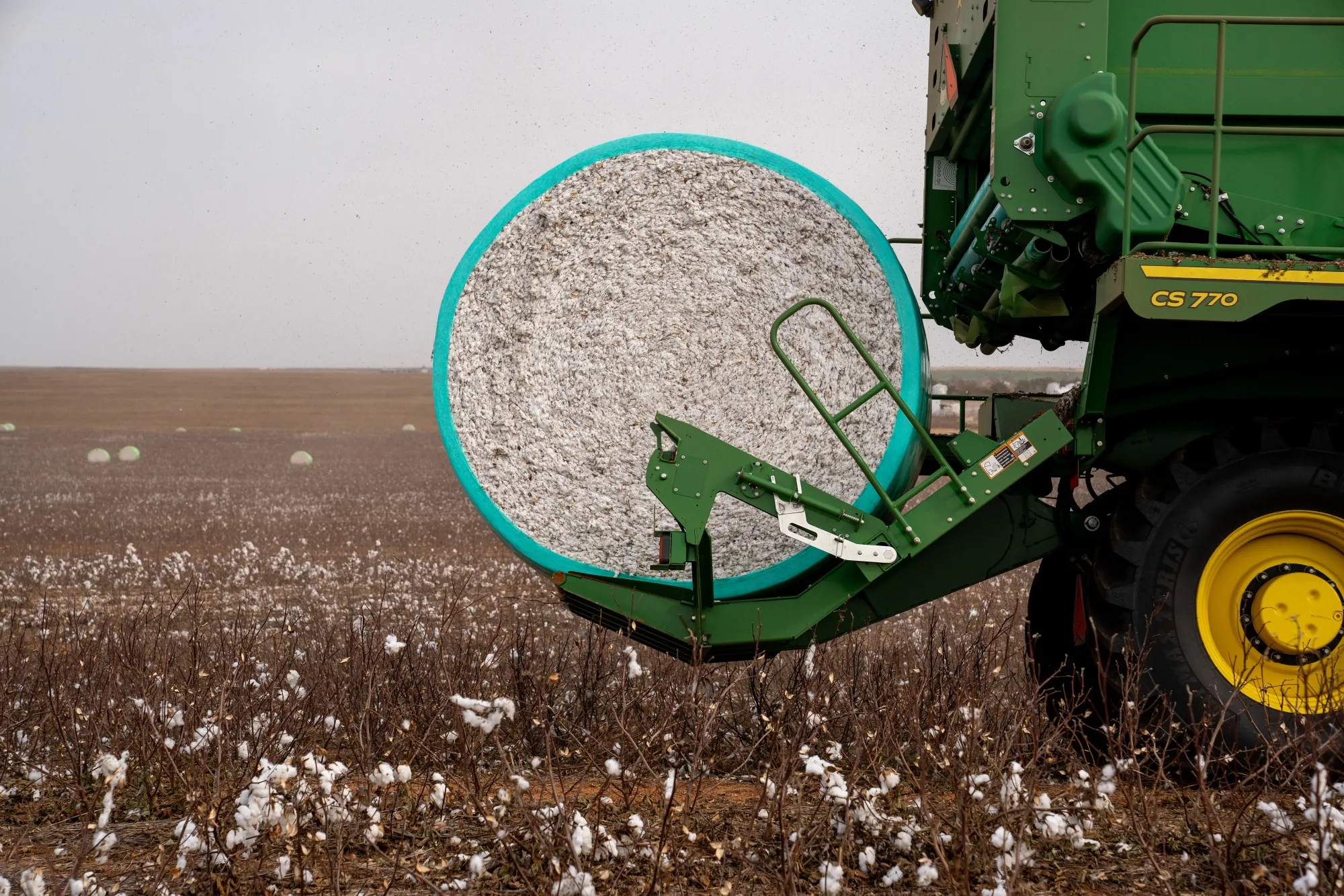A bale of harvested cotton during harvest in Oklahoma, US.