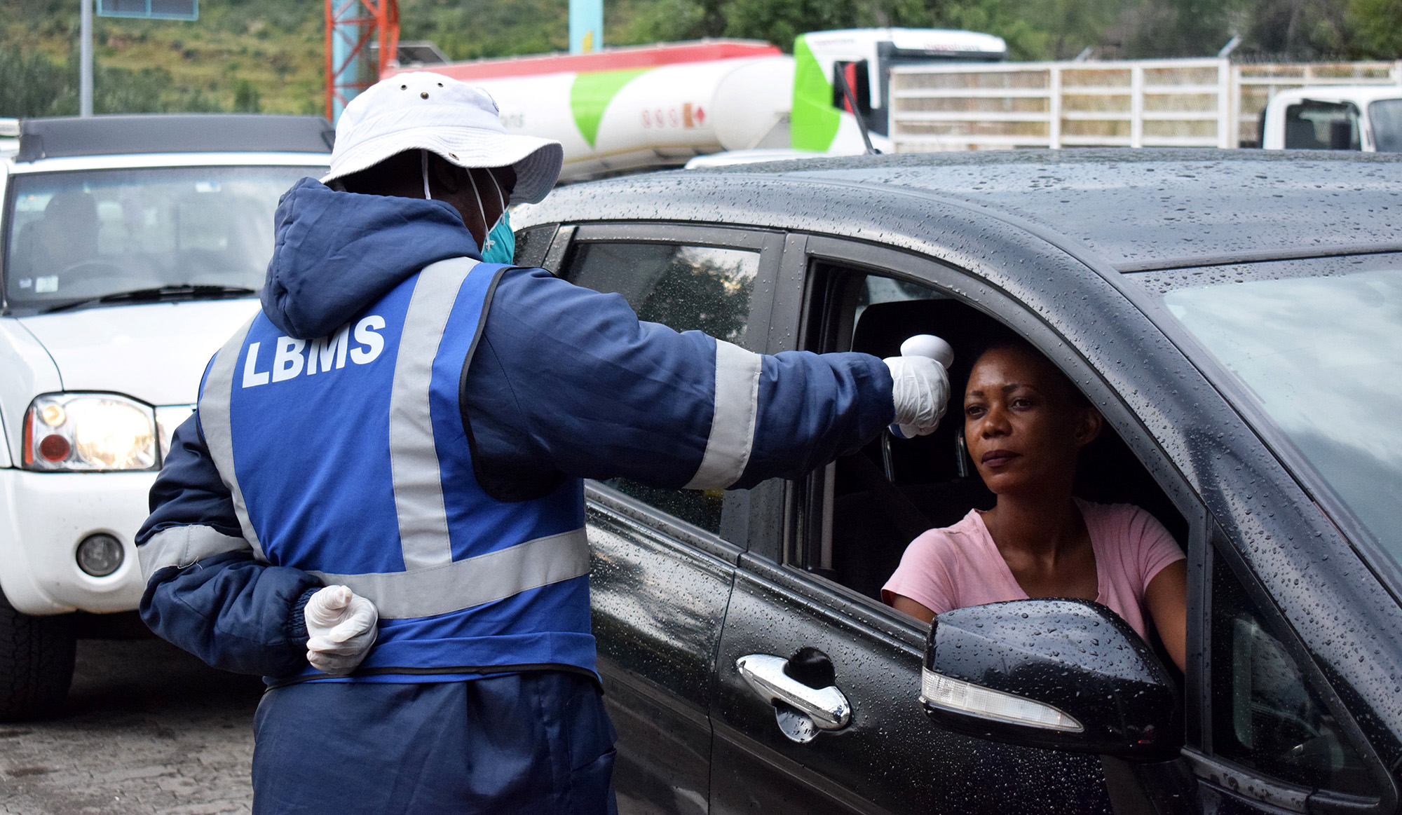 A health official measures temperatures of motorists in Maseru, Lesotho&nbsp;on March 10.