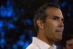 George P. Bush takes questions from reporters in Lakeway, Texas, on Feb. 10, 2022.