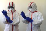 Kenyan health workers prepare for cases of the new coronavirus at the Mbgathi District hospital in Nairobi.