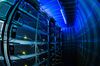 Lights illuminate ethernet cables on mining rigs operating inside a shipping container converted into a mobile cryptocurrency mining farm, operated by BitCluster, at Rodniki Industrial Park in Rodniki, Russia.