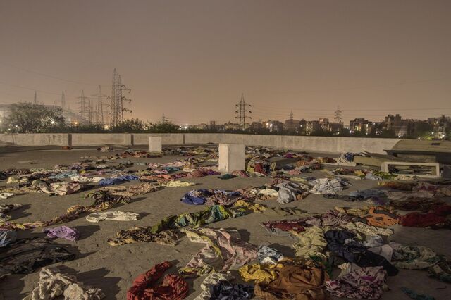 The discarded garments of Covid-19 fatalities on the rooftop of a crematorium in New Delhi in April.