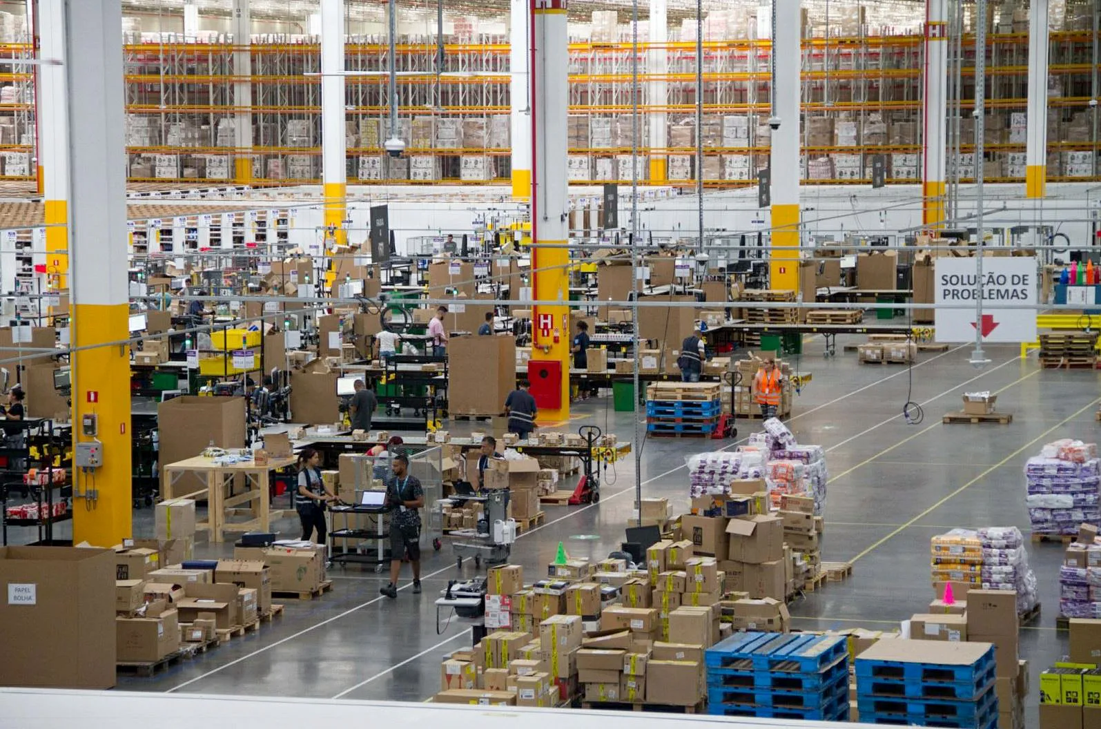 People work at an Amazon distribution warehouse near Sao Paulo.