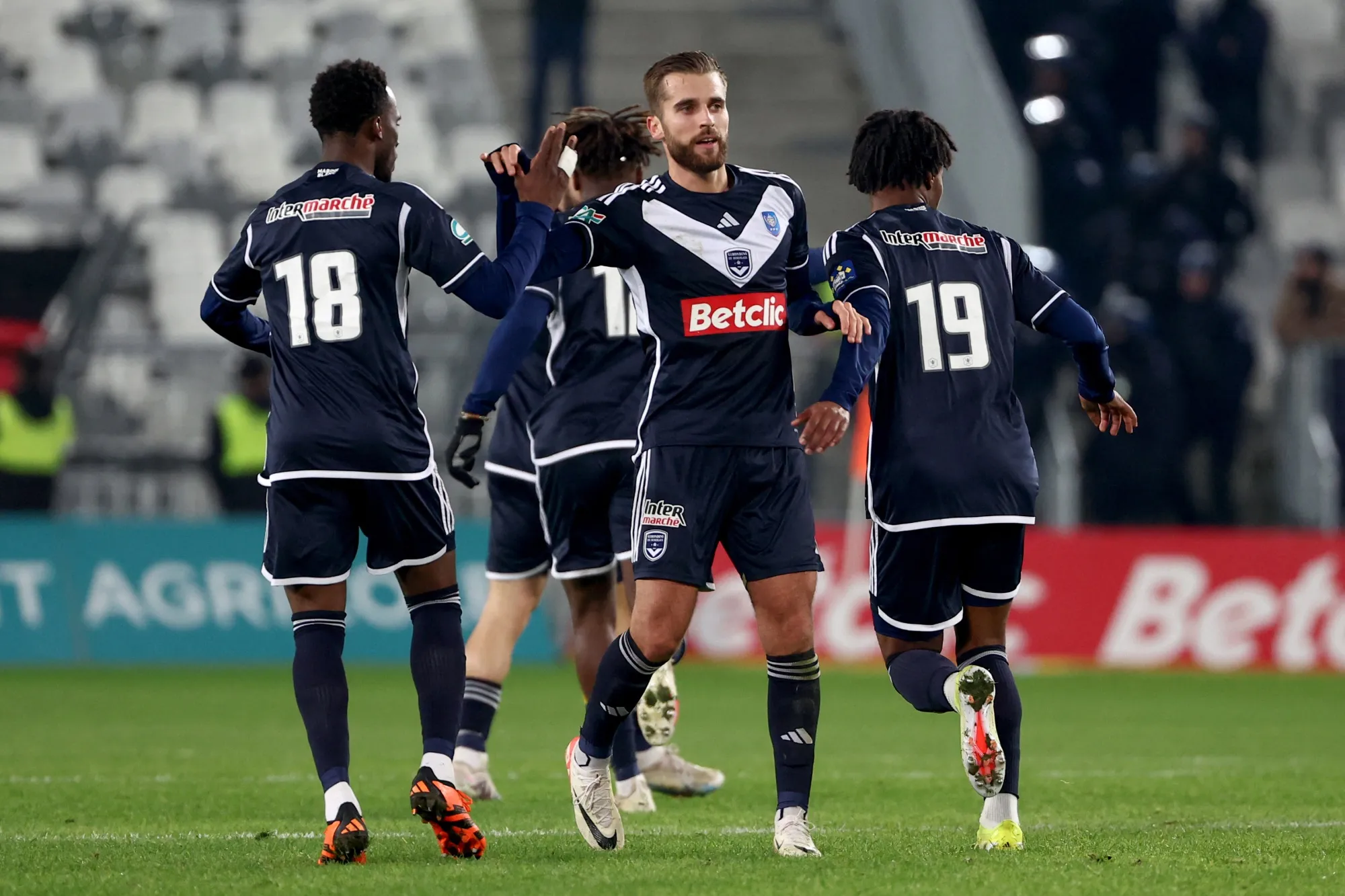 Girondins de Bordeaux players celebrate after scoring a goal against OGC Nice in Bordeaux,&nbsp;France, in January.