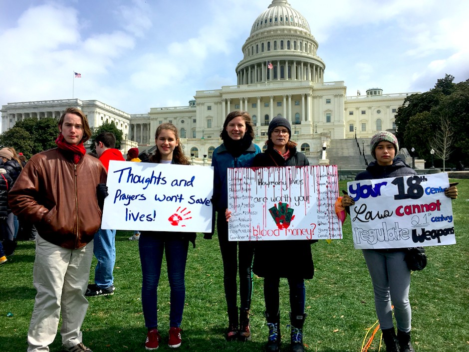 Case Van Stolk, Annabel Dobbyn, Avery Johnson, Devin Lucas, and Parker Diamond (left to right) participate in Wednesday's National School Walkout Day, in Washington D.C.