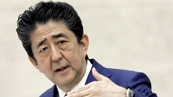 Japan’s Abe Leaves Hospital as Minister Denies Health Scare
