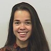 headshot of Leda Alvim