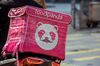 An insulated food bag branded with Foodpanda logo sits on the back of a motorcycle in Hong Kong, China, on Thursday, Feb. 20, 2020.
