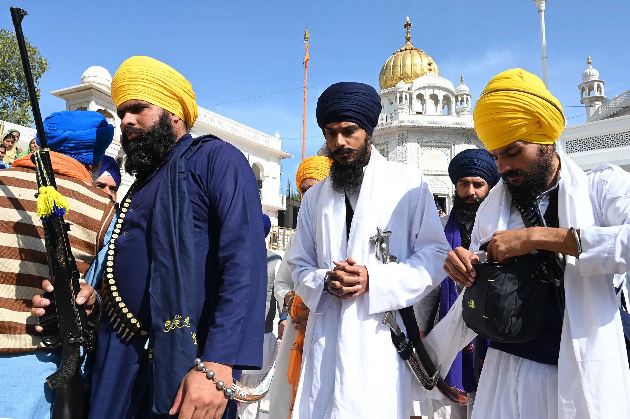 Amritpal Singh, center, at the Golden Temple in Amritsar, on March 3.