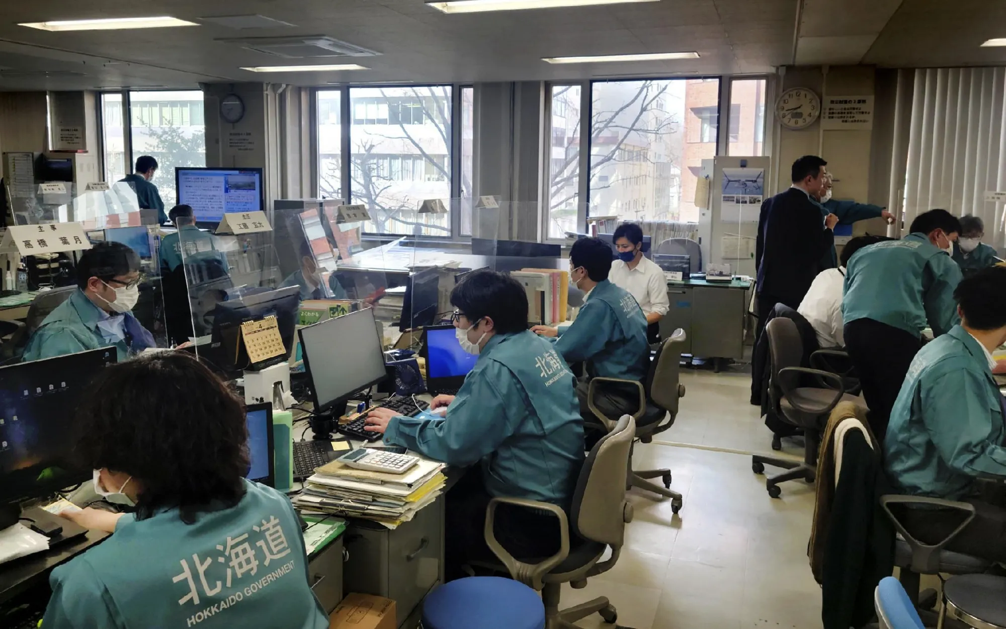 Government officials in Sapporo, Hokkaido prefecture, Japan, on April 13.