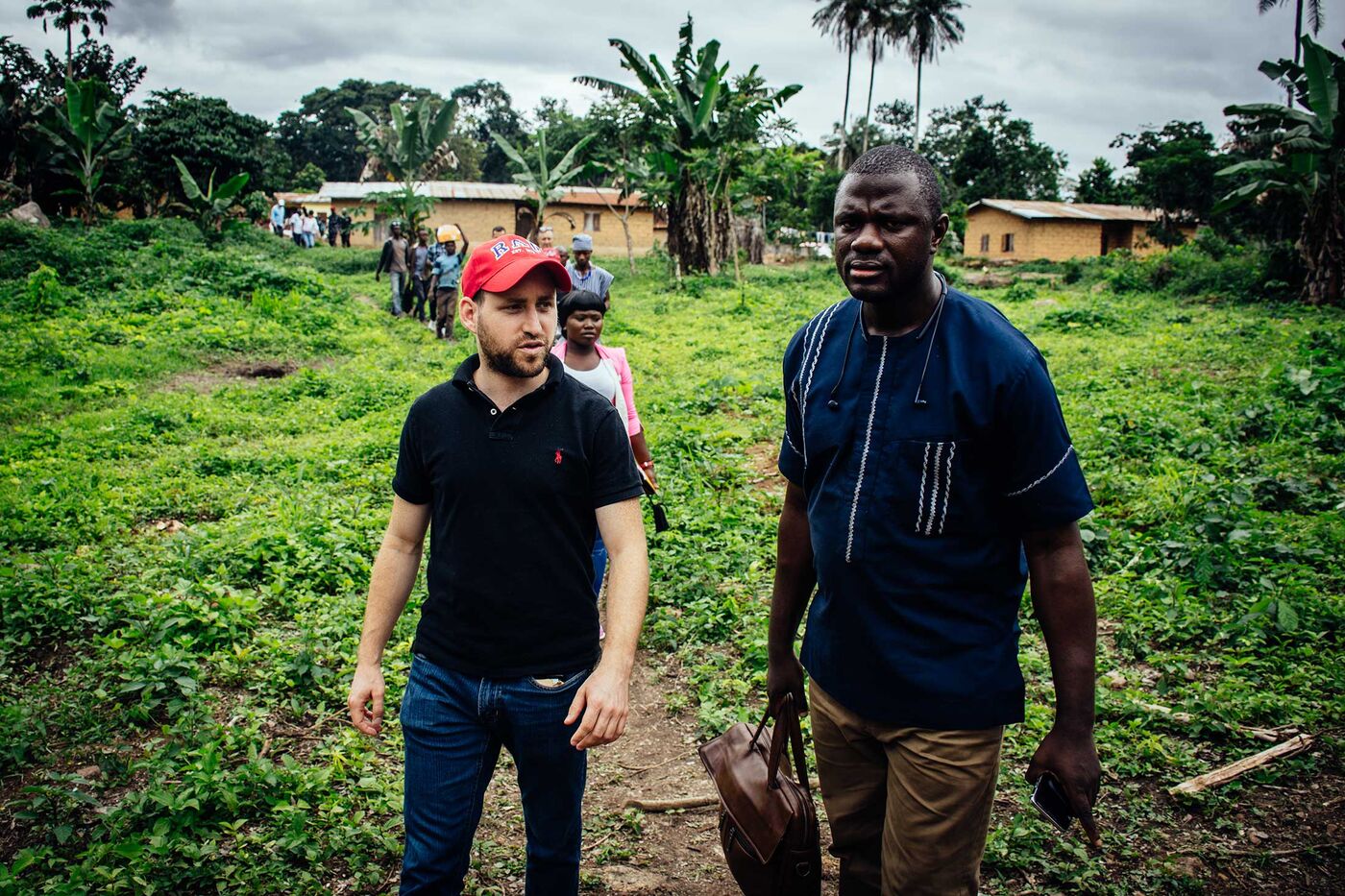 Pastor Momoh and Ezi Rapaport head to the pit where the peace diamond was found.