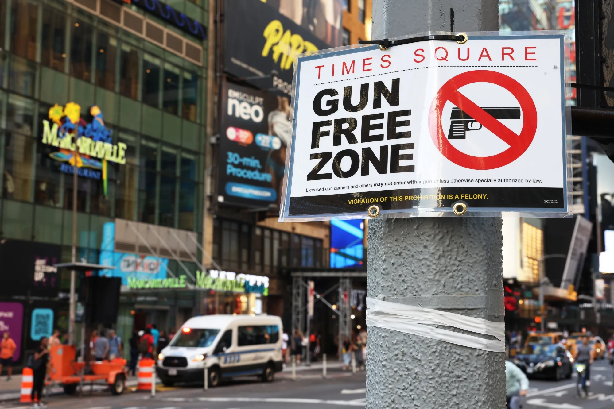 A "Gun Free Zone" sign posted in Times Square in New York.&nbsp;