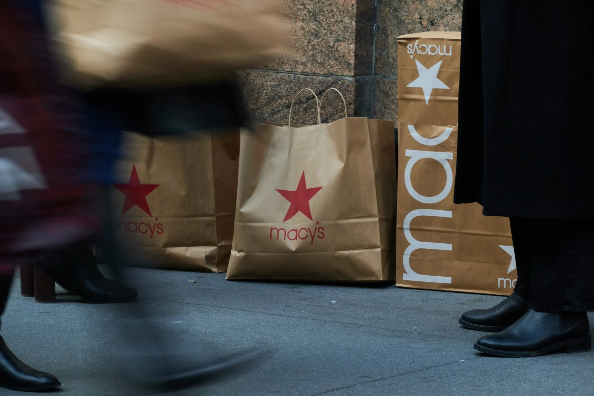 The company said the cuts include about 2,350 employees, mostly in corporate positions.