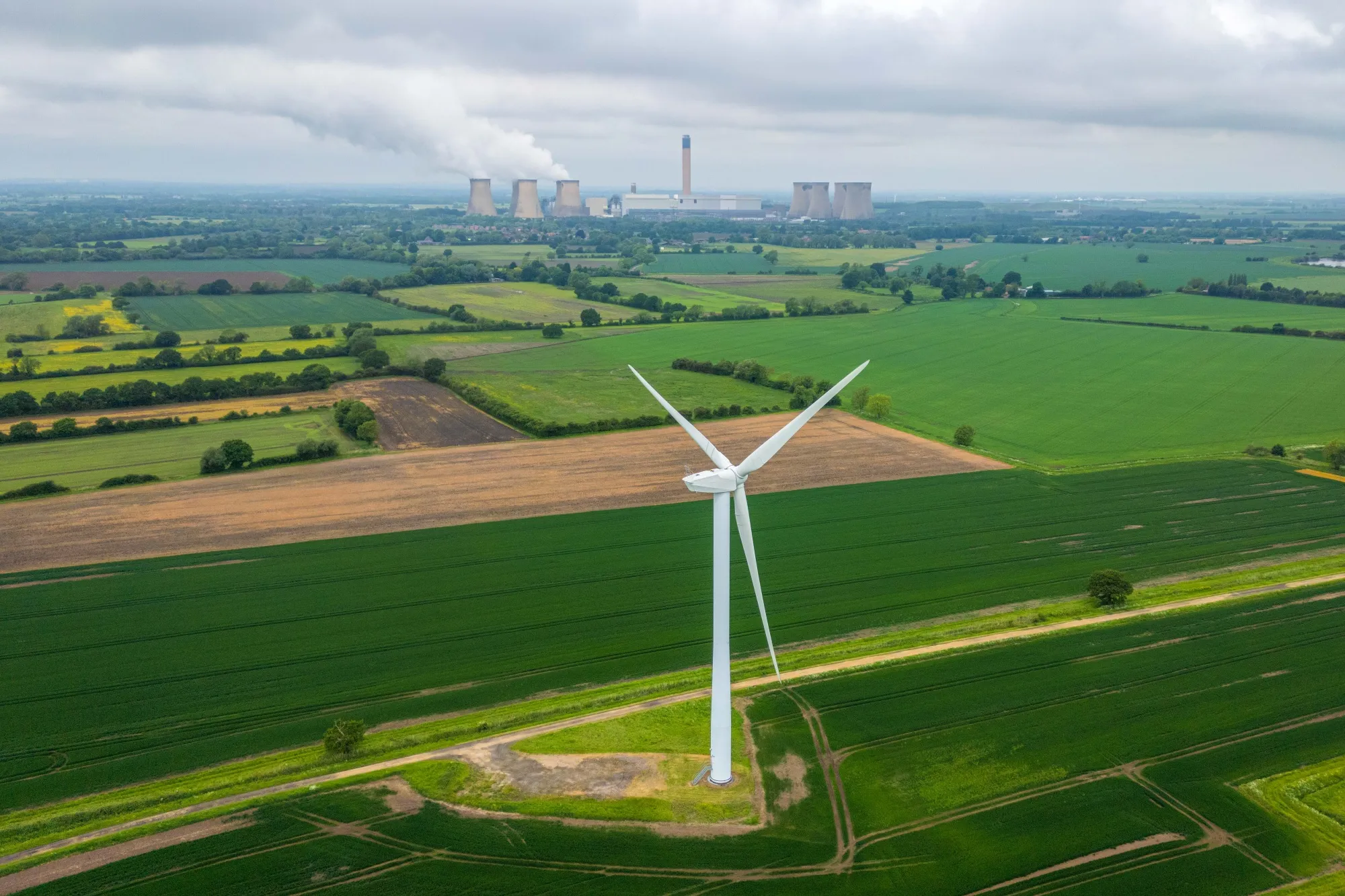 A wind turbine in a field near the Drax Power Station, operated by Drax Group Plc, near Selby, UK, in May&nbsp;2024.