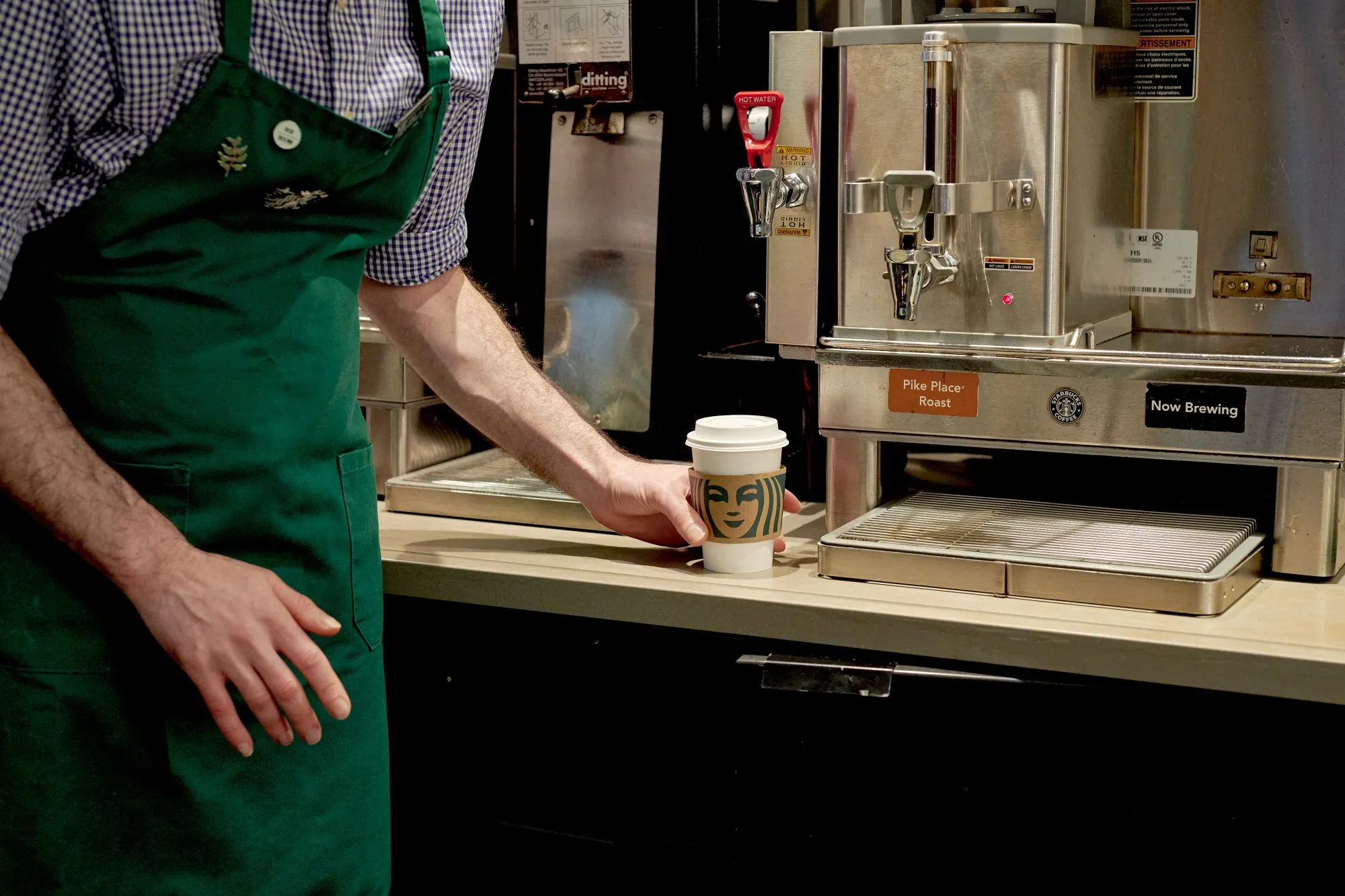 A barista makes a coffee at a Starbucks location in New York.