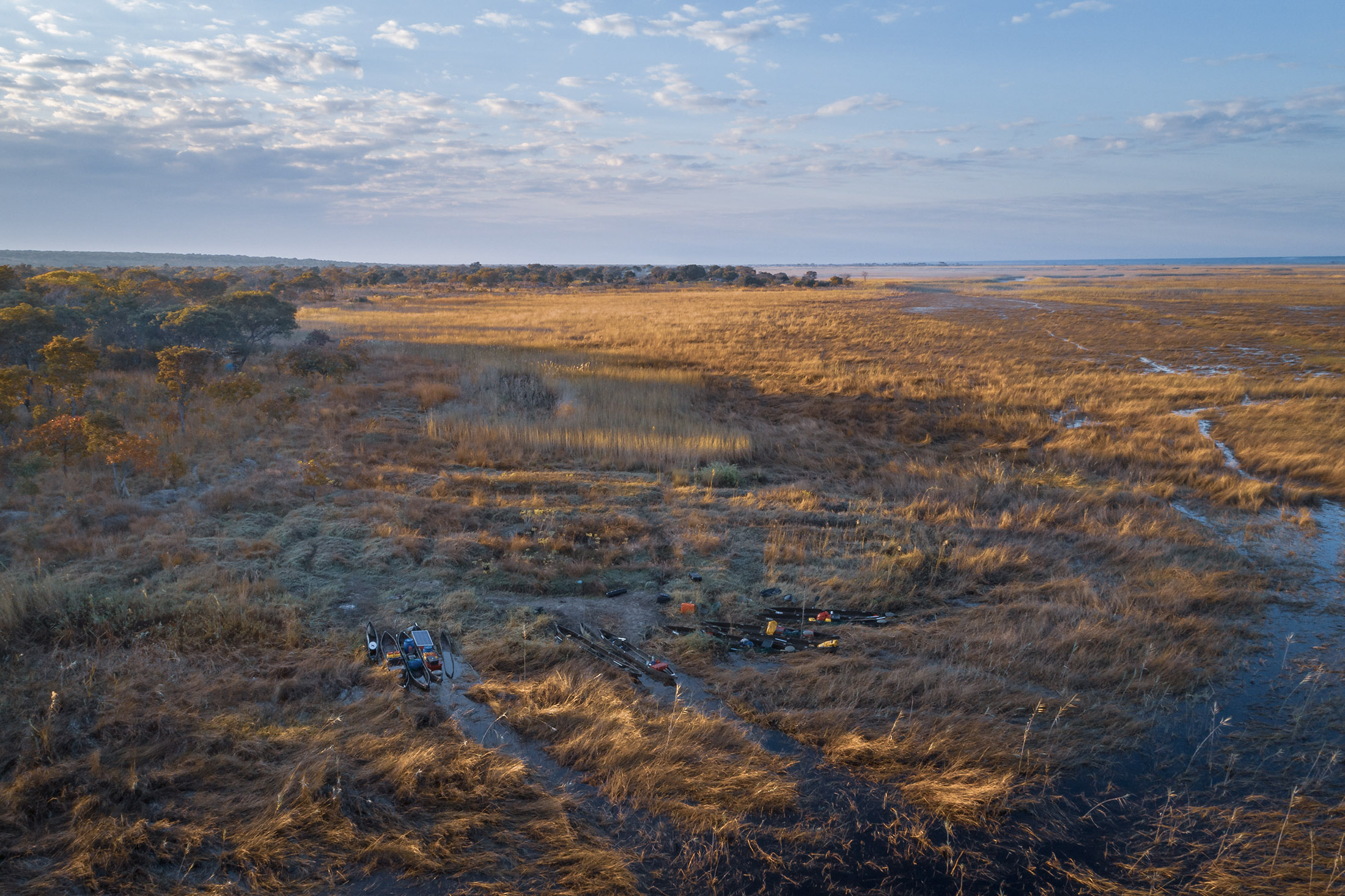 Mokoros on the shore of the Cuando River. Photographer: Kostadin Luchansky/National Geographic Society