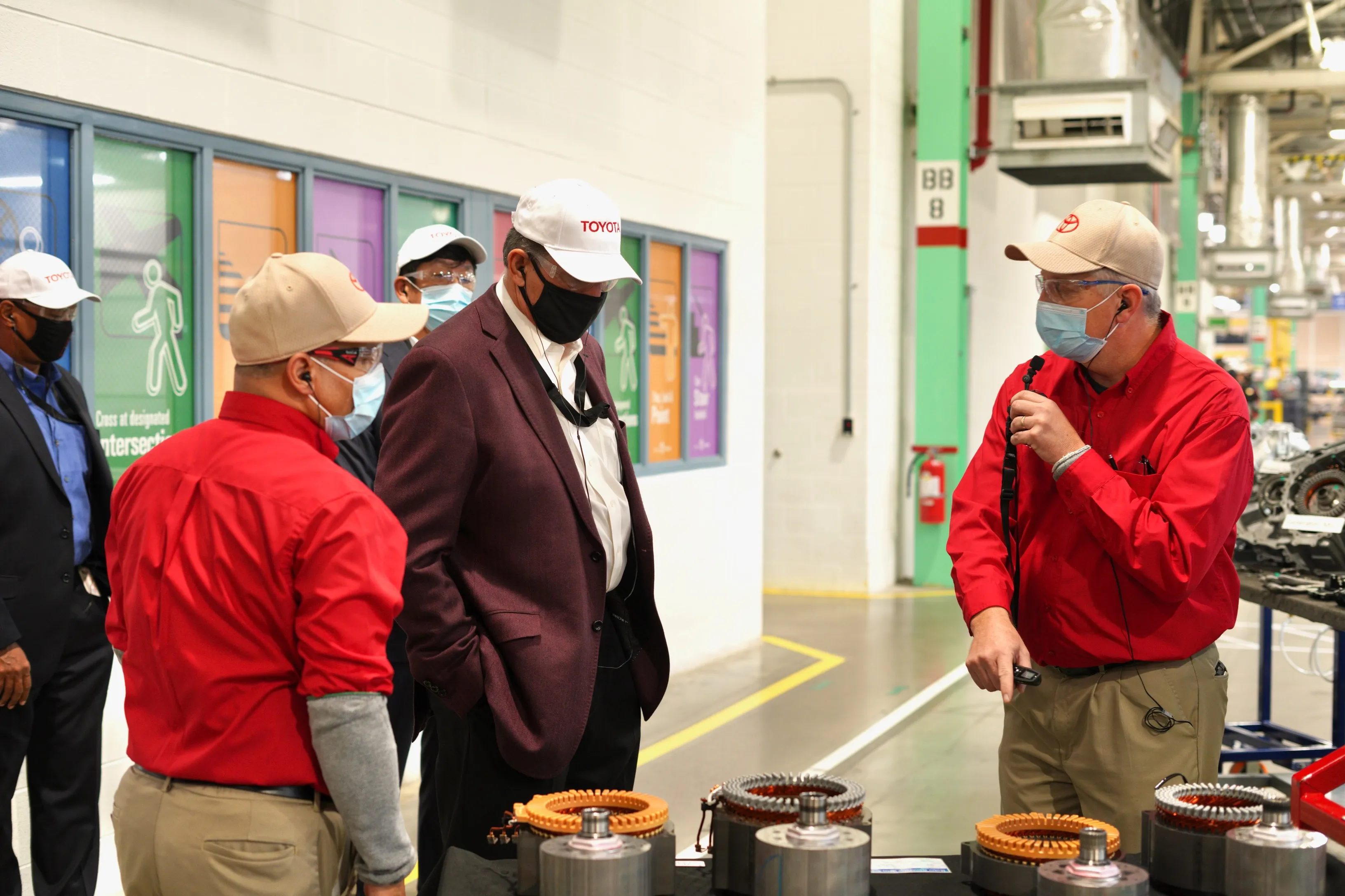 Senator Joe Manchin, center, tours the West Virginia Toyota factory, on Nov. 11, 2021.