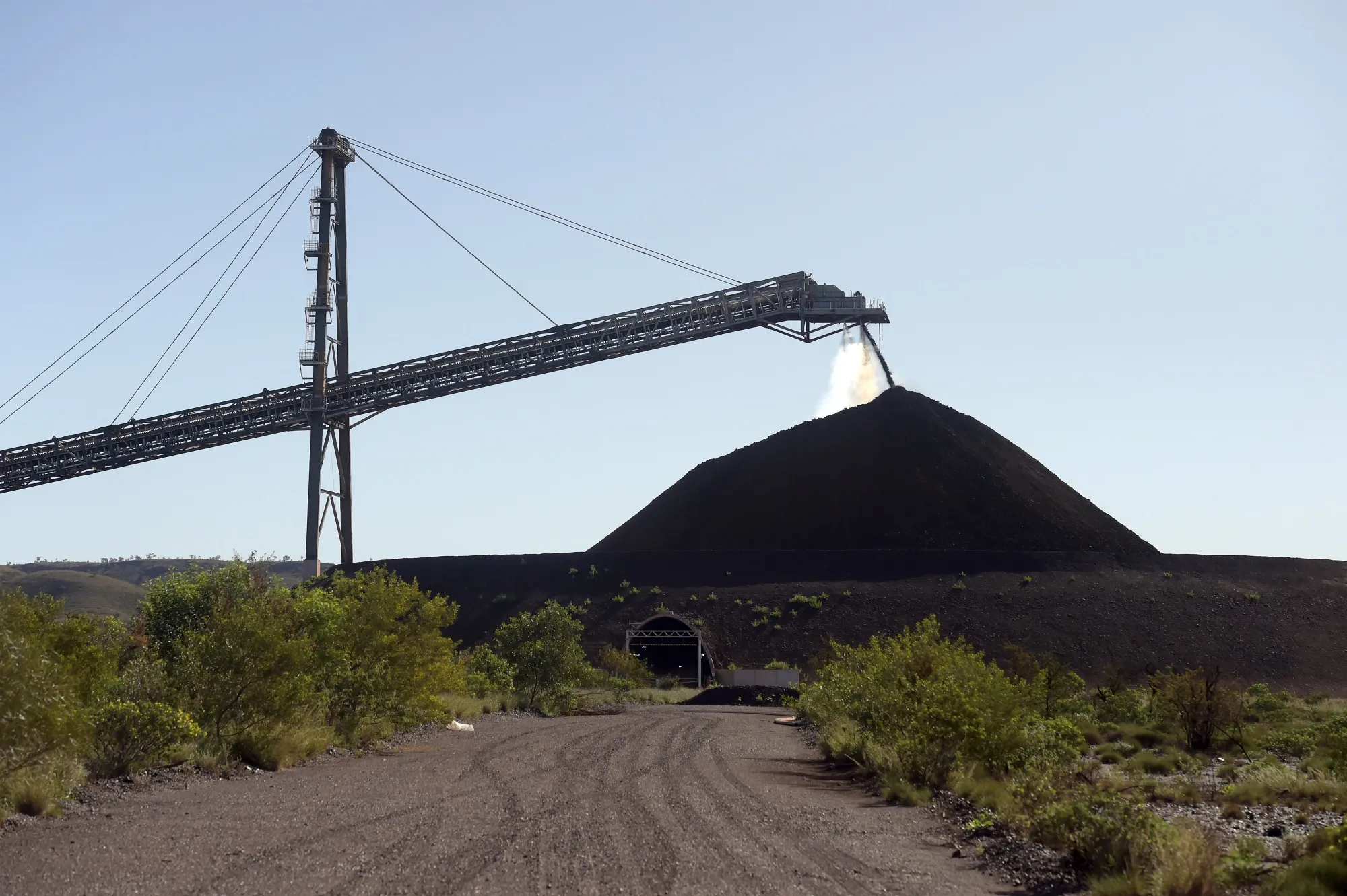 Iron ore futures dropped to $99.45 a ton, the lowest intraday price since Nov. 19, before trading at $99.70 at 10:59 a.m. local time.