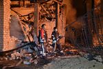 Emergency services attend the site of a Russian attack on energy infrastructure in Kharkiv, on Oct. 7. Photographer: Sergey Bobok/AFP/Getty Images