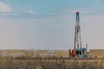 A rig drills for crude oil in the Permian Basin in West Texas.
