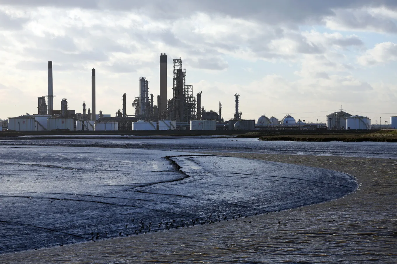 Fuel storage silos on the Thames estuary shoreline&nbsp;in Thurrock, UK.