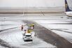 An ice-covered runway at Berlin Brandenburg Airport