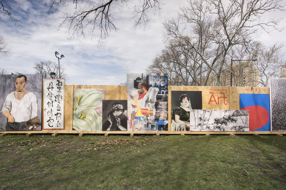 Part of a new constructed wall featuring replicas of famous art sits outside the Philadelphia Museum of Art as it undergoes construction