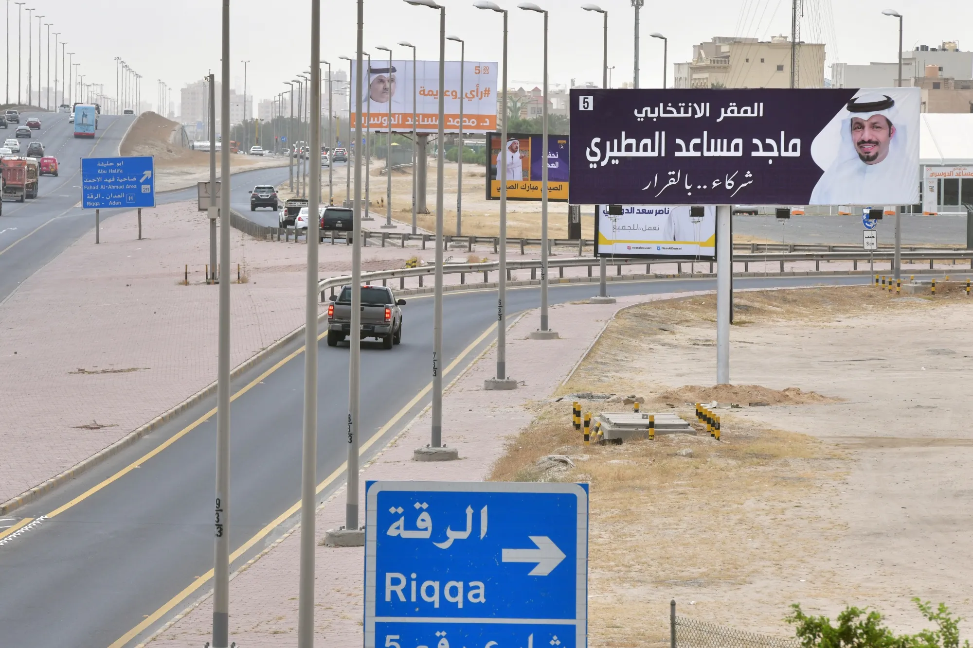 Posters and banners of candidates are seen on the billboards ahead of the parliamentary elections in Kuwait City.