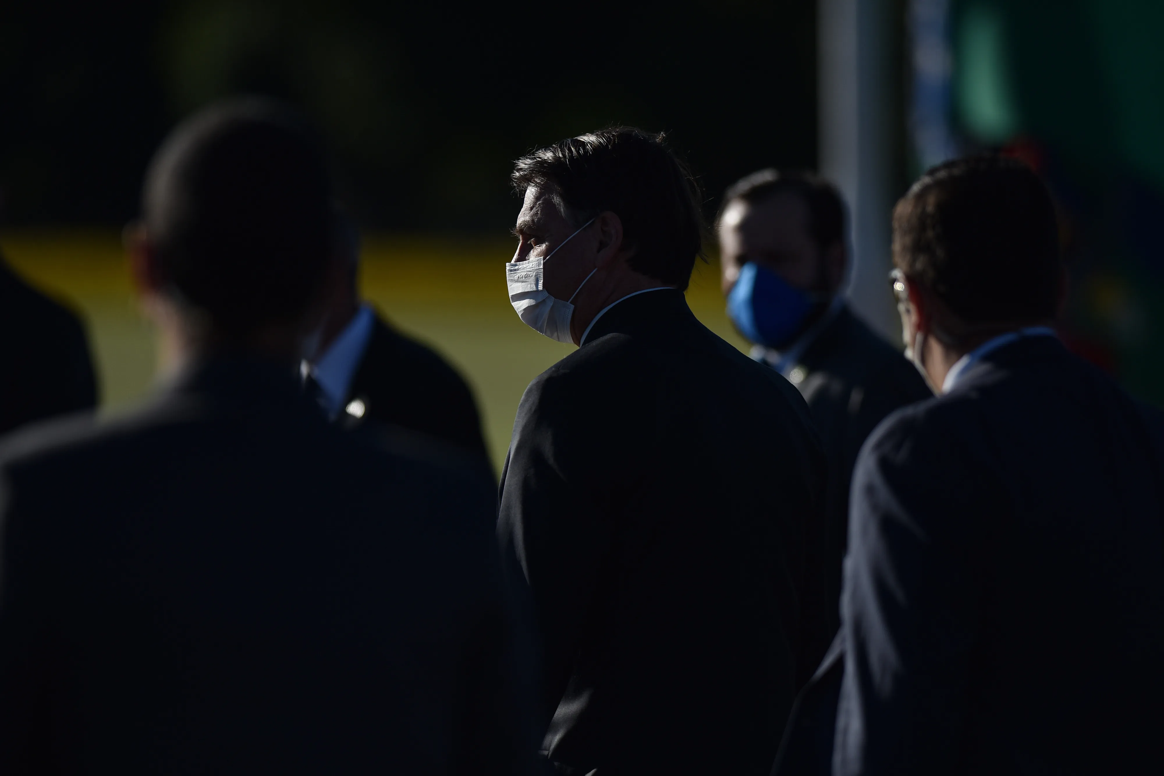 Jair Bolsonaro&nbsp;wears a protective mask during the National Flag Raising ceremony at Alvorada Palace in Brasilia, Brazil, on&nbsp;May 12.
