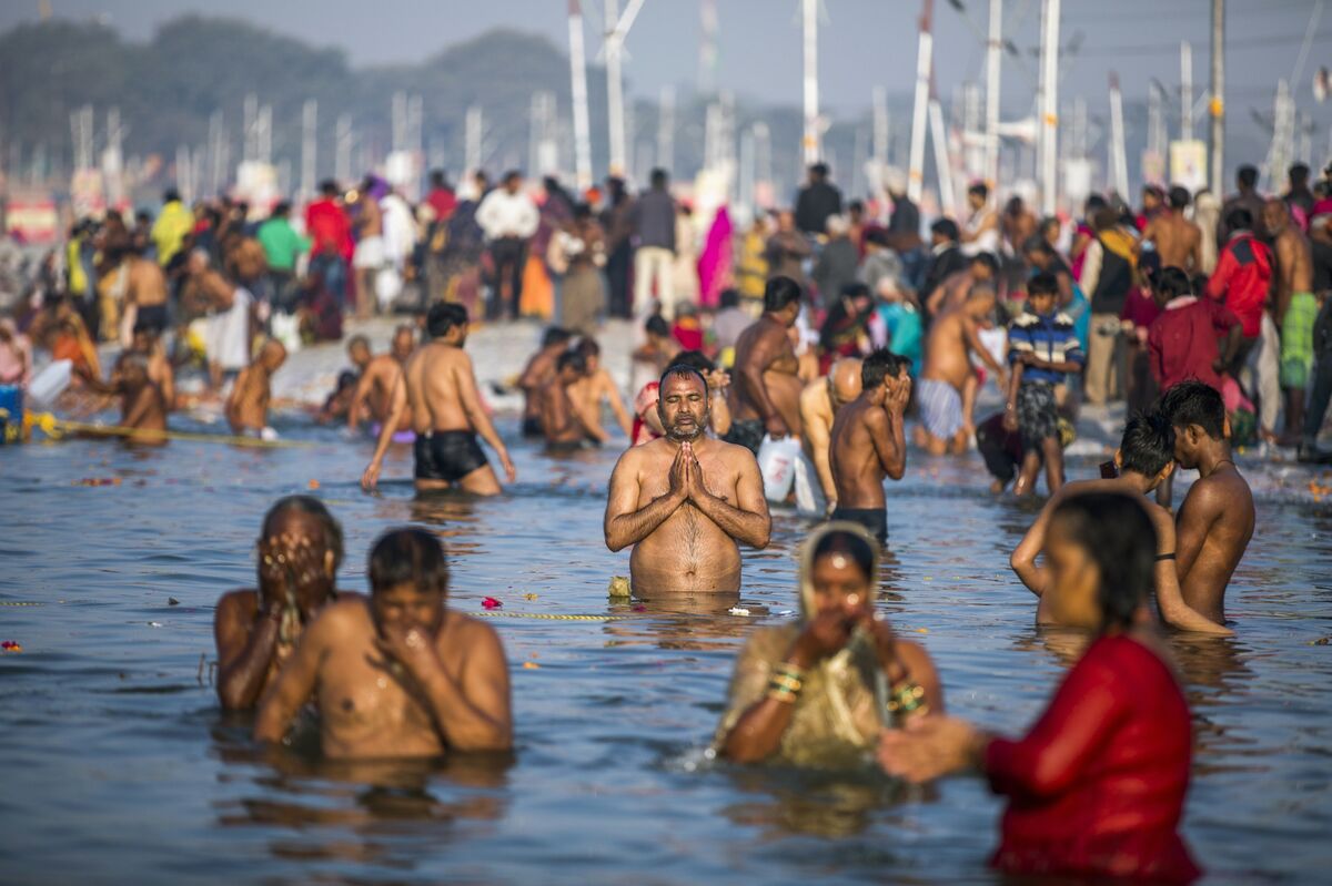 Image result for Hindus plunges into River <a class='inner-topic-link' href='/search/topic?searchType=search&searchTerm=GANGES' target='_blank' title='click here to read more about GANGES'>ganges</a> to wash out their sins